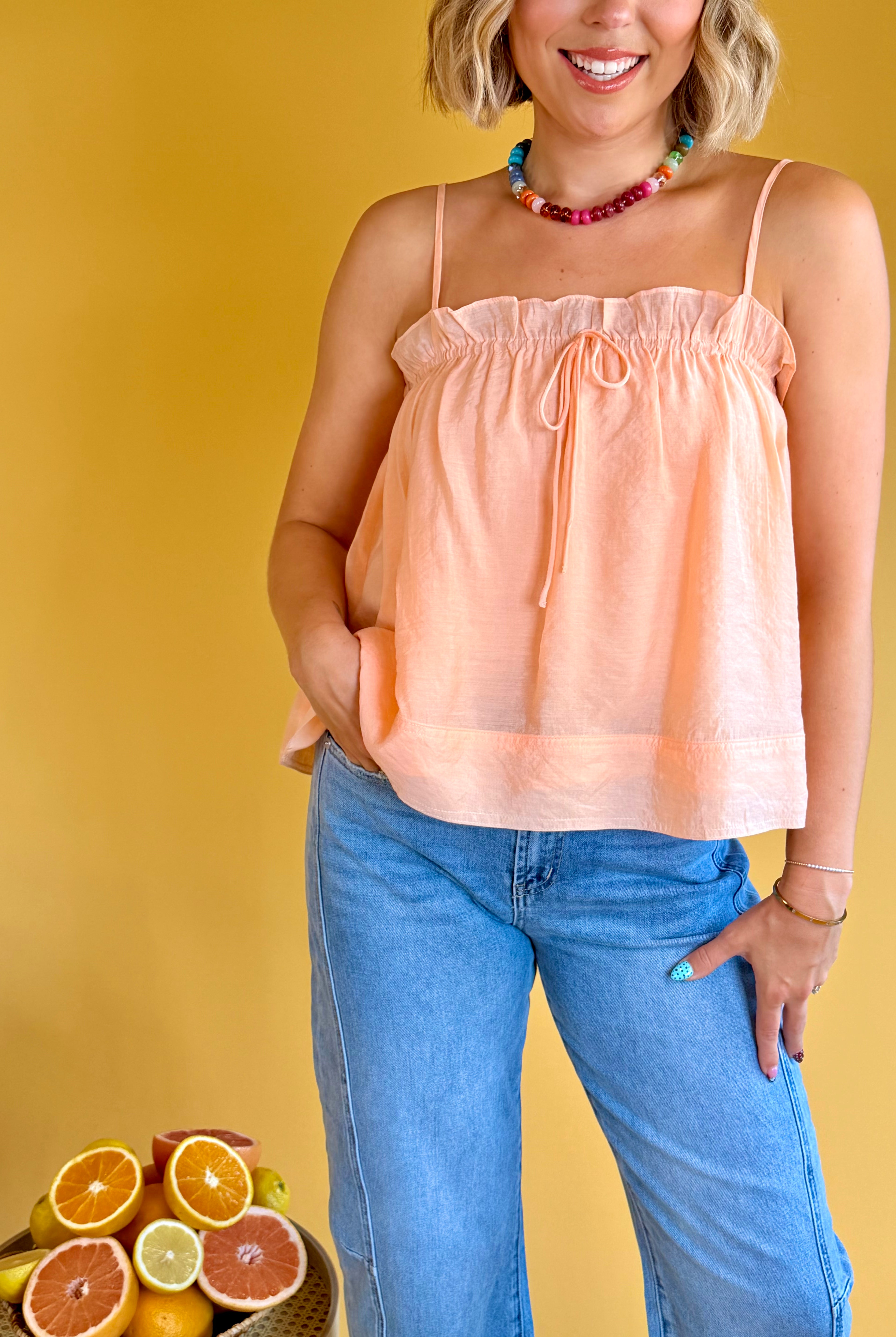 Cantaloupe color, coral, spaghetti straps, flowy top, square neckline, bow detail, summer, summer tops, vacation, vacay outfit, cute, girly, feminine