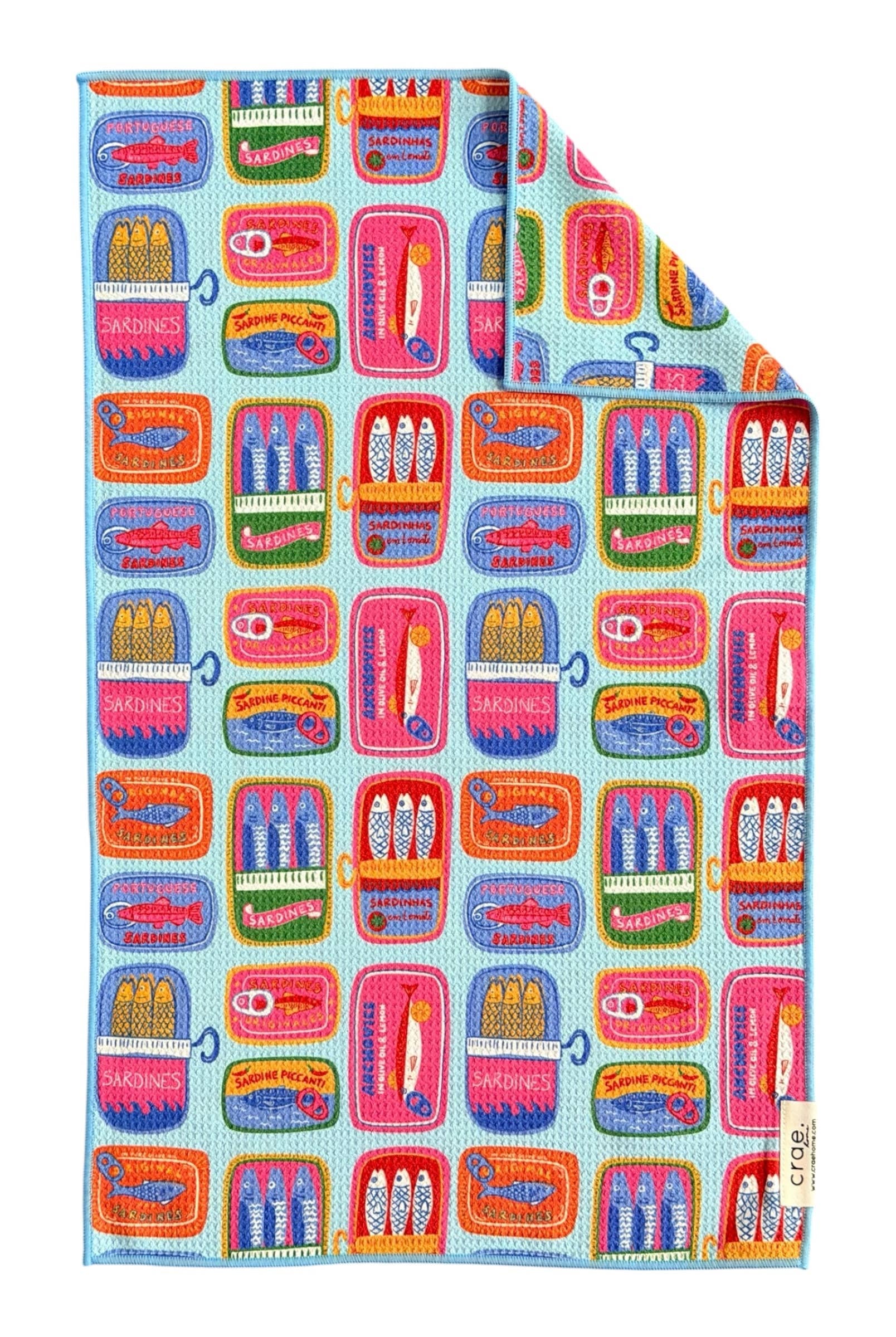 Colorful fabric with pattern of small boxes and items on a white background, colorful towel, sardine print, household item, gifts, summer color hand towel