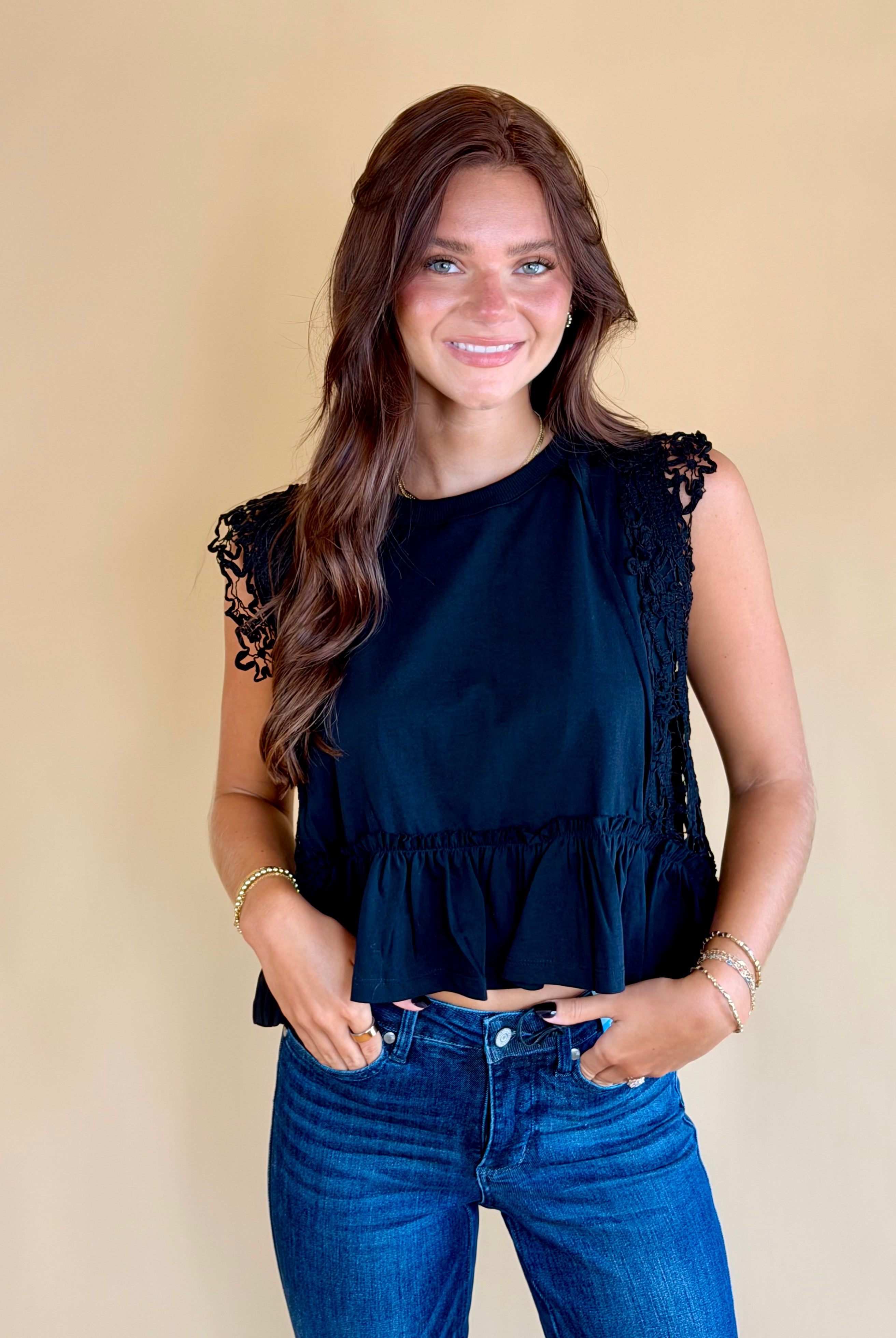 Black lace top, work attire, business casual, elevated top, ruffle bottom, lace trim, black tops