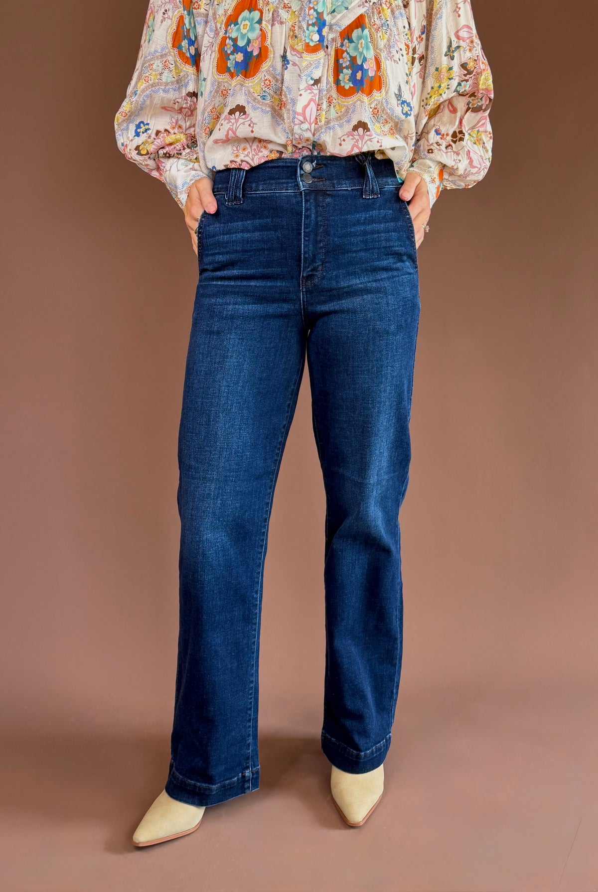Dark-wash Judy Blue stretch jeans with a high rise, wide trouser leg, finished hem, and 33-inch inseam.