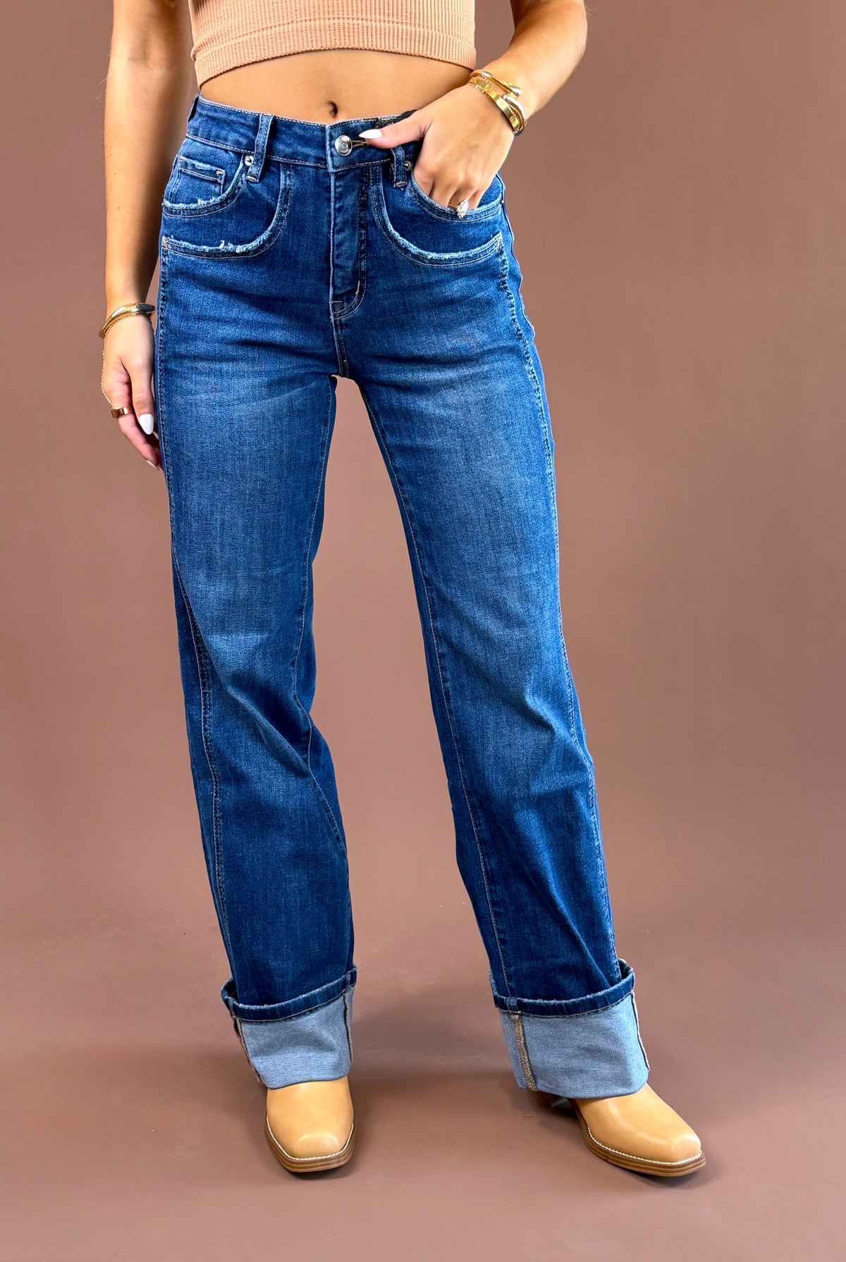 MICA Easy Does It women’s medium-wash high-rise jeans with a relaxed wide-leg silhouette, five-pocket styling, and wide cuffed hems