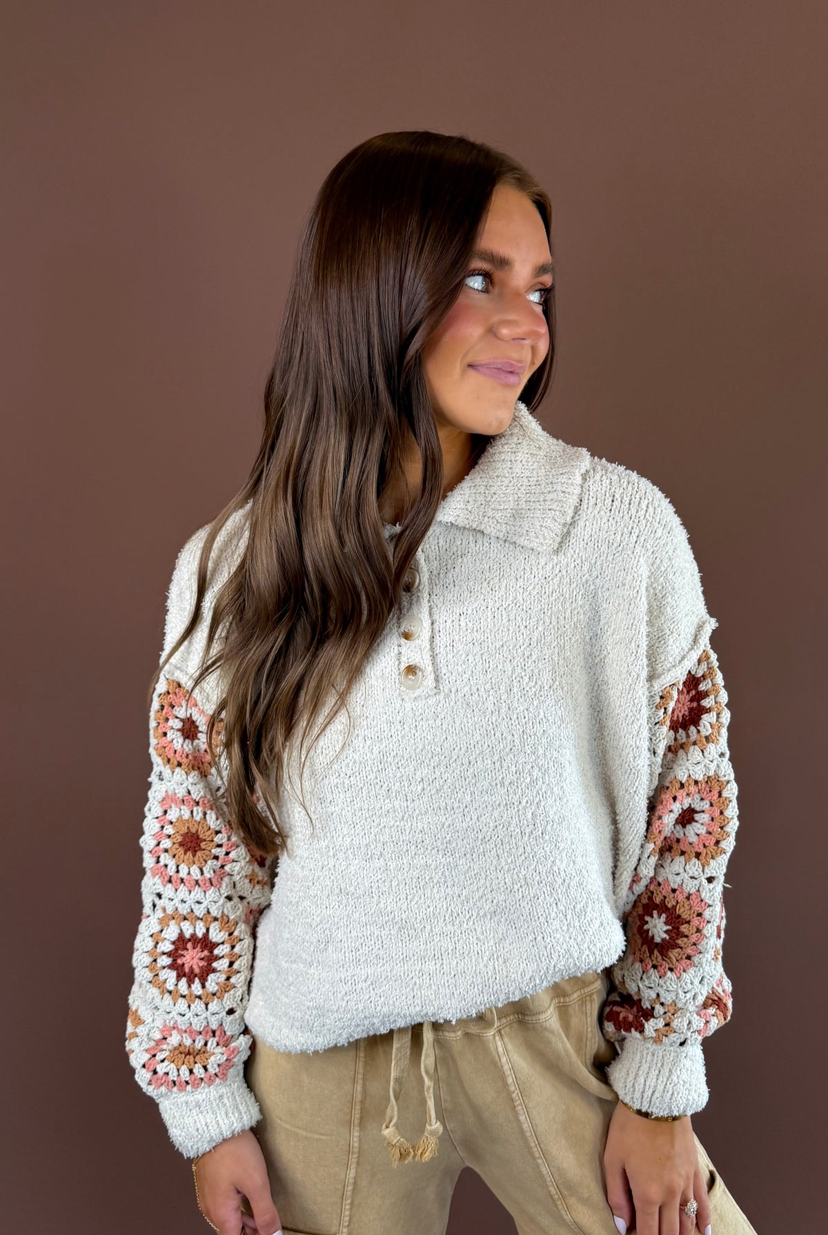 POL Kaleidoscope Soul women’s cream textured knit pullover with colorful crochet sleeves, a collar, and partial Henley button front