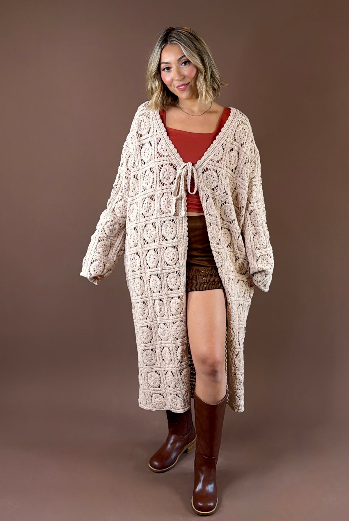 POL Storybook Duster featuring long open knit crochet duster with mixed weave patterns and tie