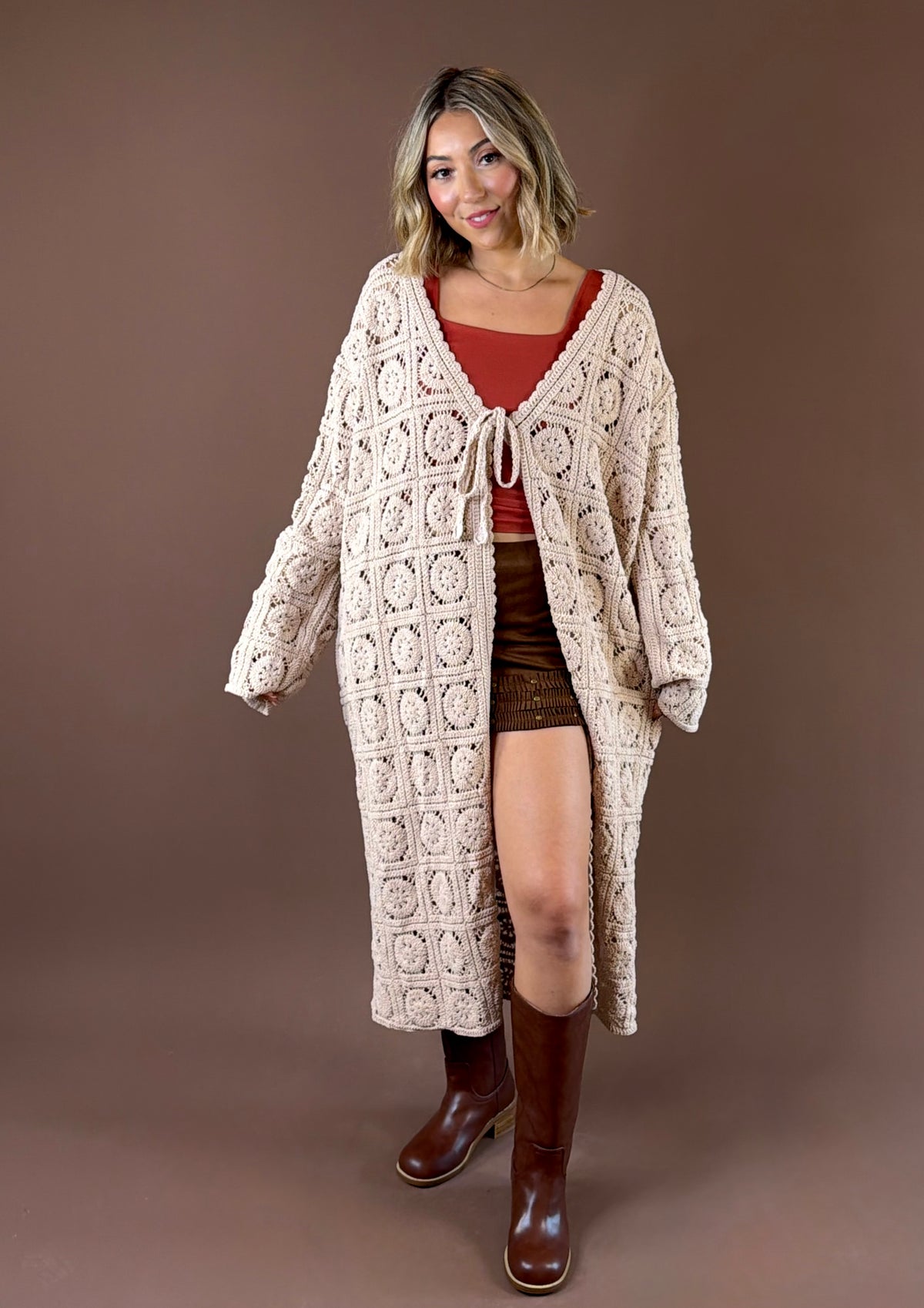 POL Storybook Duster featuring long open knit crochet duster with mixed weave patterns and tie