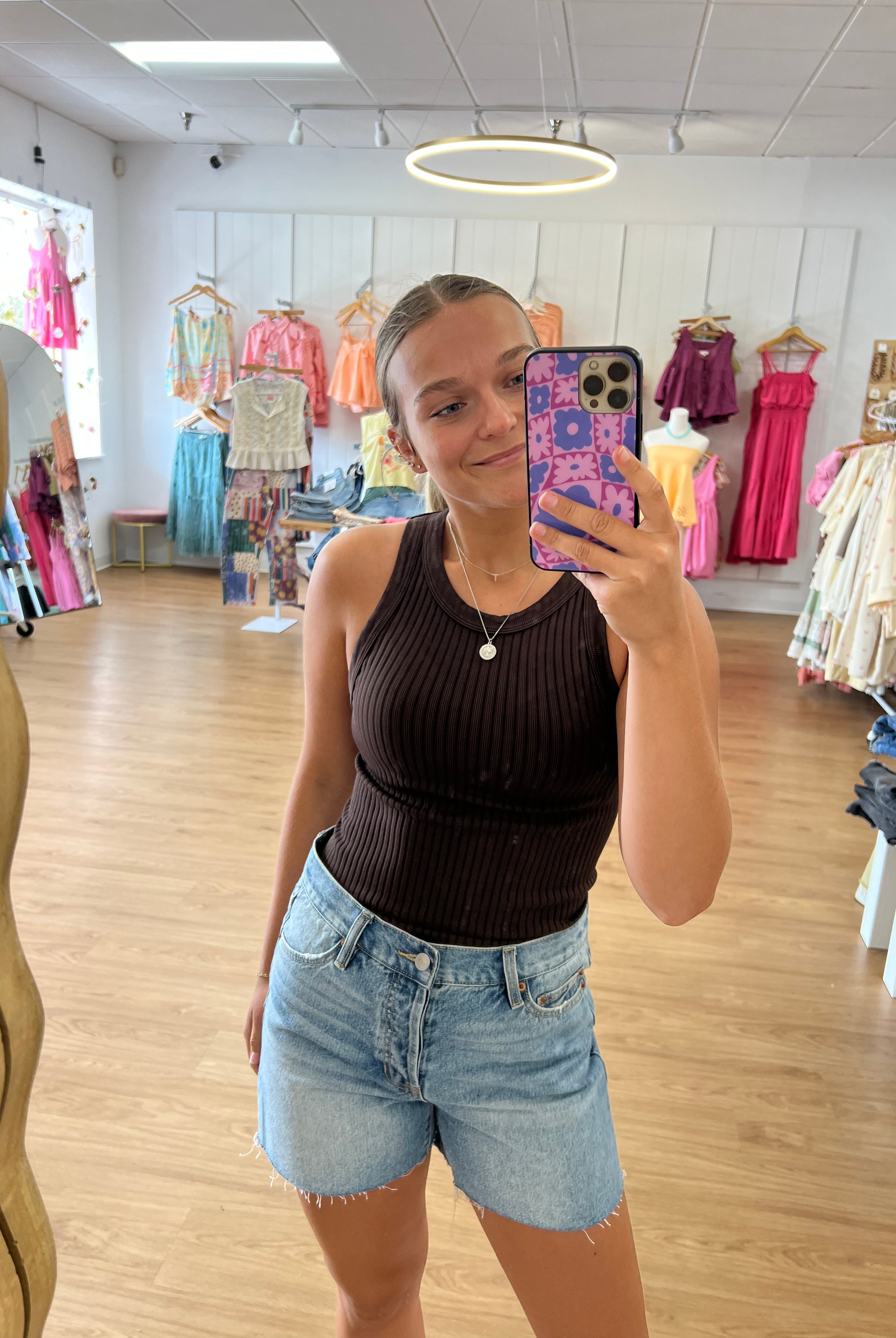 Women’s vintage black seamless cropped tank top with wide ribbed texture, a fitted silhouette, and comfortable stretch.