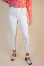 Risen High Rise Skinny Jeans: Cream