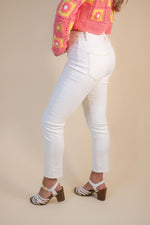 Risen High Rise Skinny Jeans: Cream