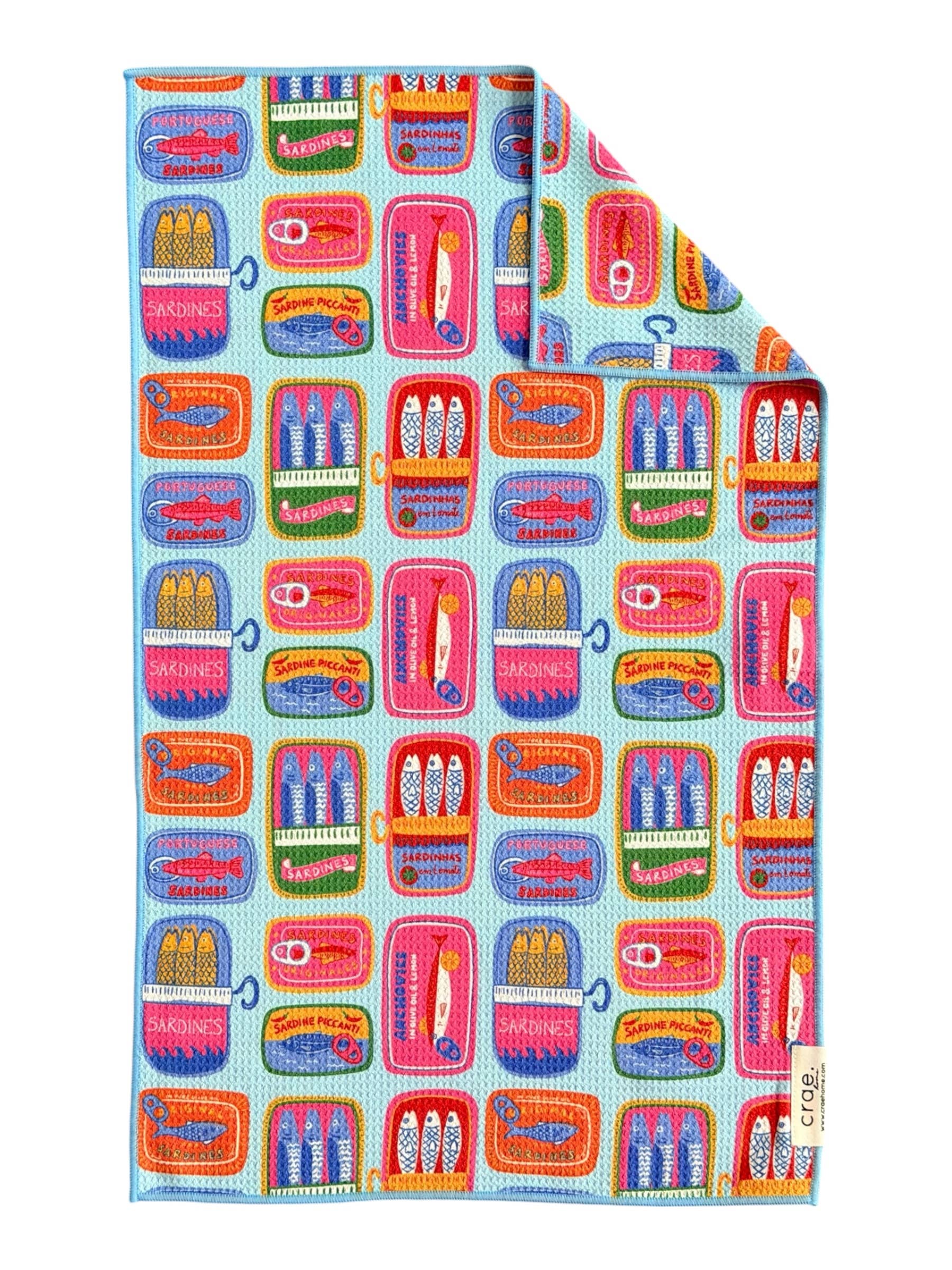 Colorful fabric with pattern of small boxes and items on a white background, colorful towel, sardine print, household item, gifts, summer color hand towel 