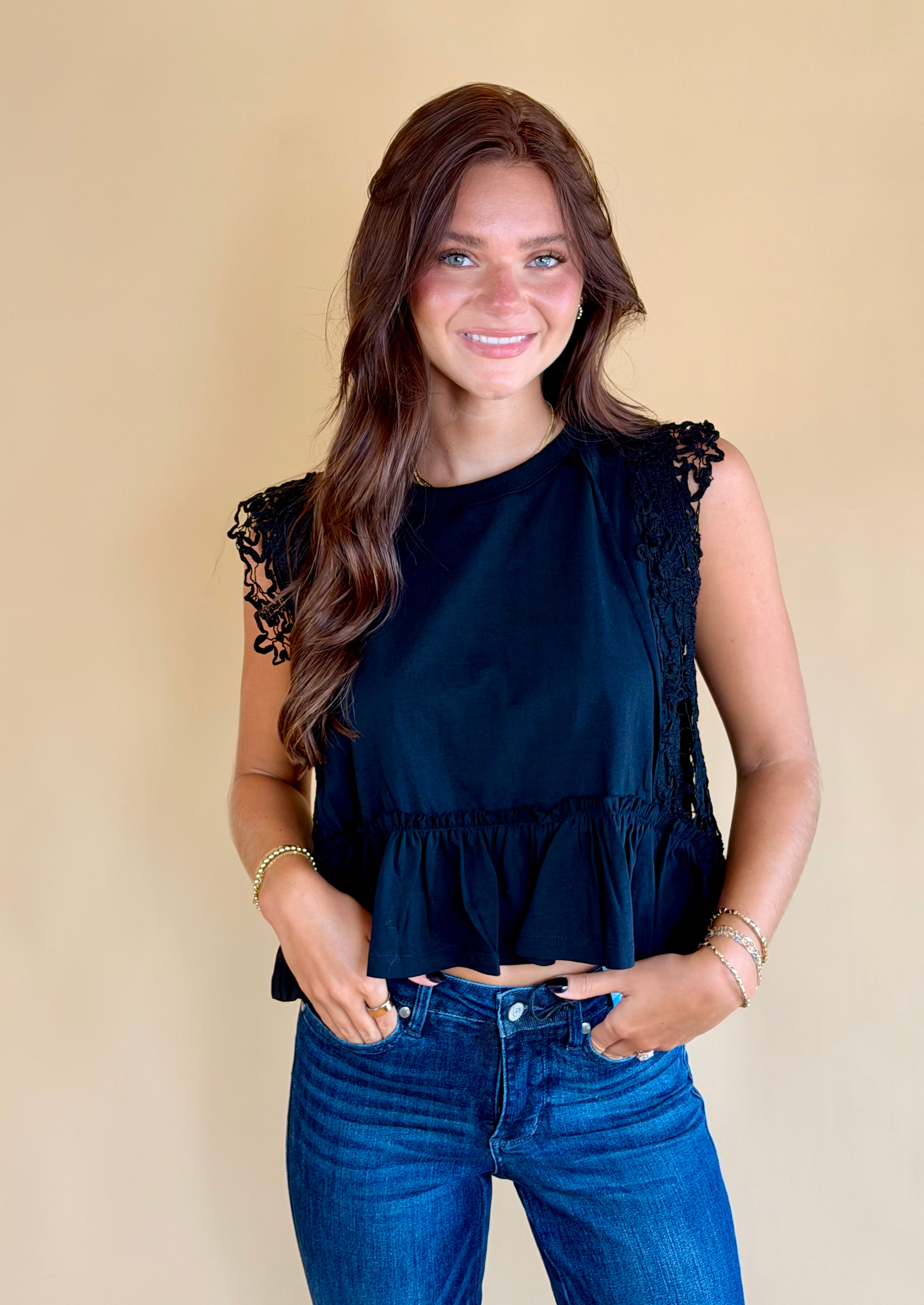 Black lace top, work attire, business casual, elevated top, ruffle bottom, lace trim, black tops