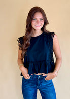 Black lace top, work attire, business casual, elevated top, ruffle bottom, lace trim, black tops