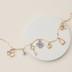 Gold Charm Necklace with Key, Heart & Floral Accents