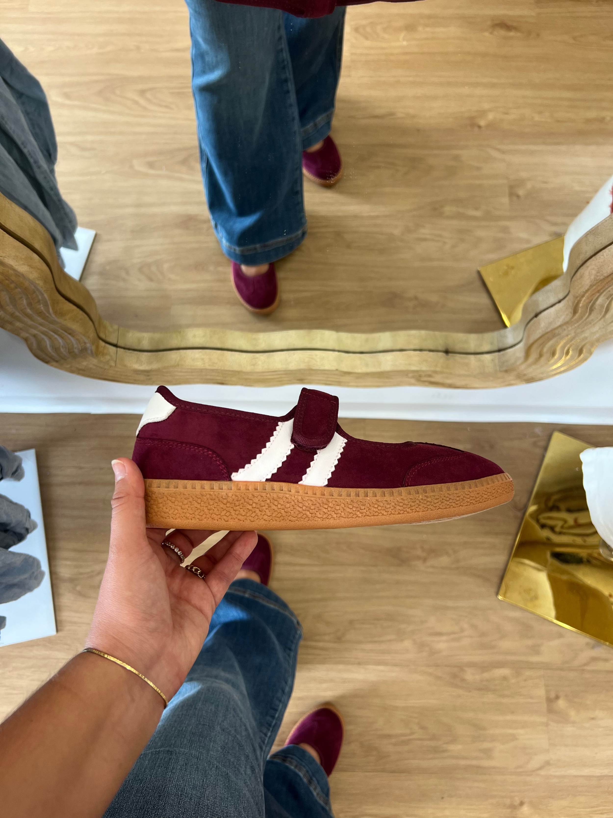 Corky’s Calm Down women’s wine Mary Jane sneakers with an adjustable top strap, cream side stripes, cushioned footbed, and gum soles