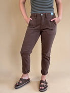 Judy Blue Aurora Weekender women’s espresso brown stretch-denim jogger pants with trouser pockets and adjustable cuffs.