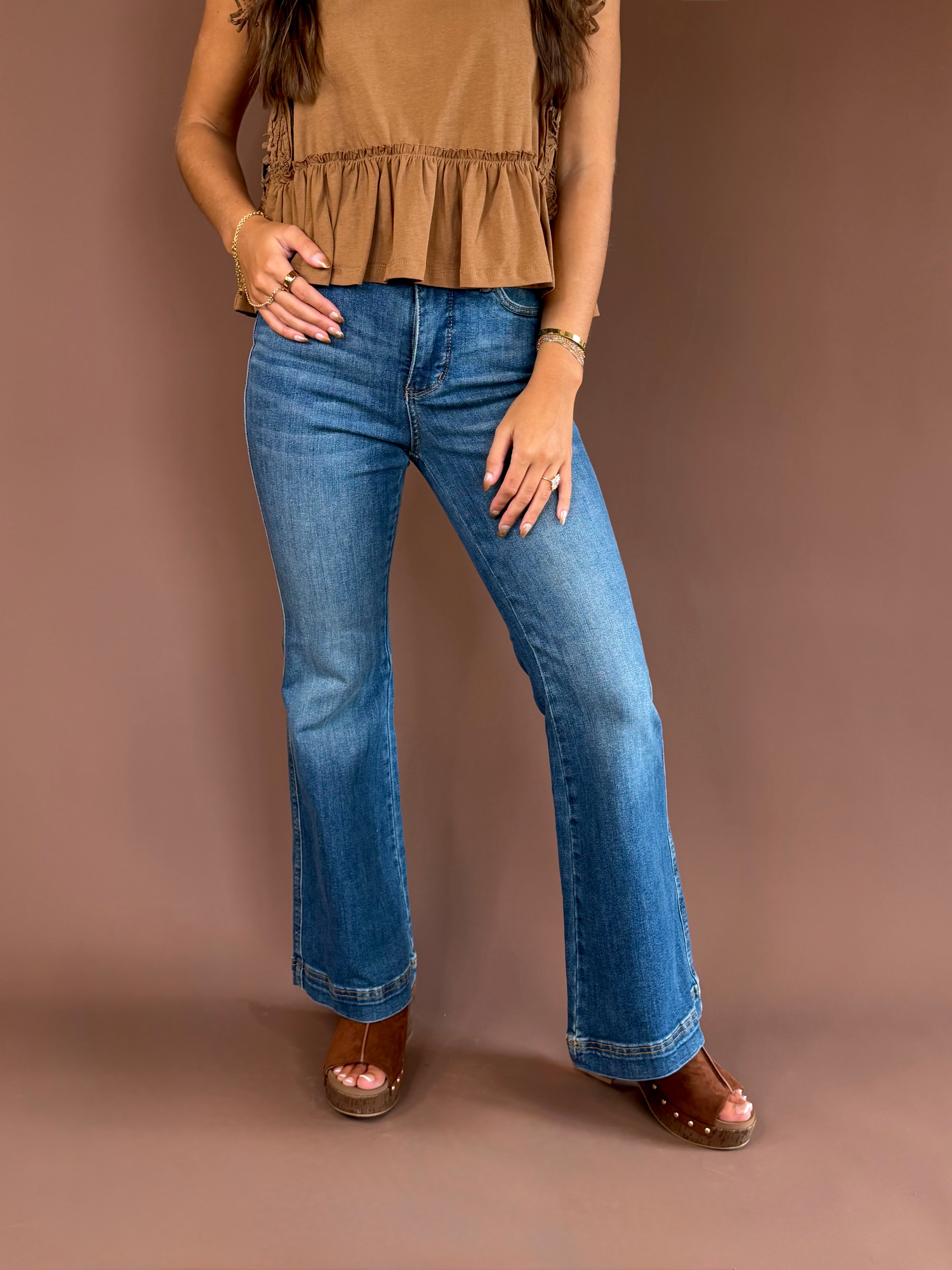 Judy Blue women’s petite high-rise tummy-control flare jeans with a double-button waist, vintage wash, and 30-inch inseam.