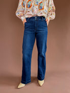 Dark-wash Judy Blue stretch jeans with a high rise, wide trouser leg, finished hem, and 33-inch inseam.