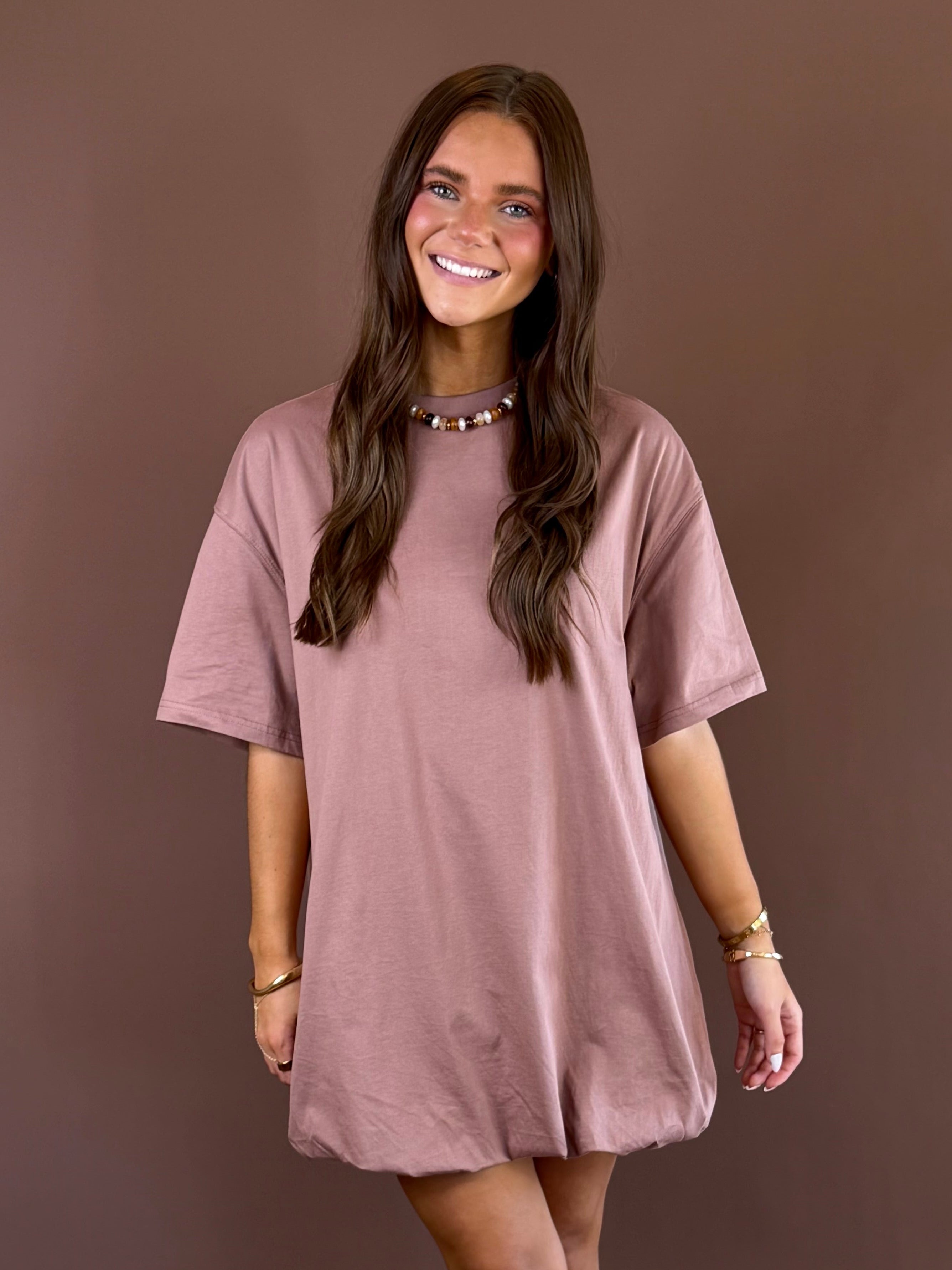 Off Duty women’s mocha cotton T-shirt dress with a round neckline, short sleeves, relaxed loose fit, and playful bubble hem silhouette