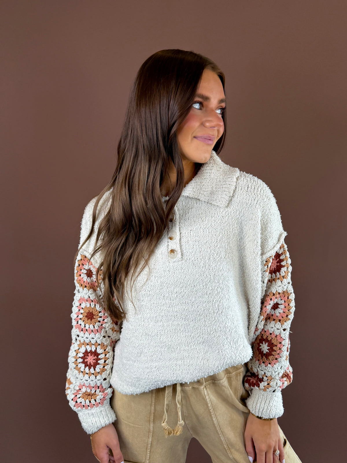 POL Kaleidoscope Soul women’s cream textured knit pullover with colorful crochet sleeves, a collar, and partial Henley button front