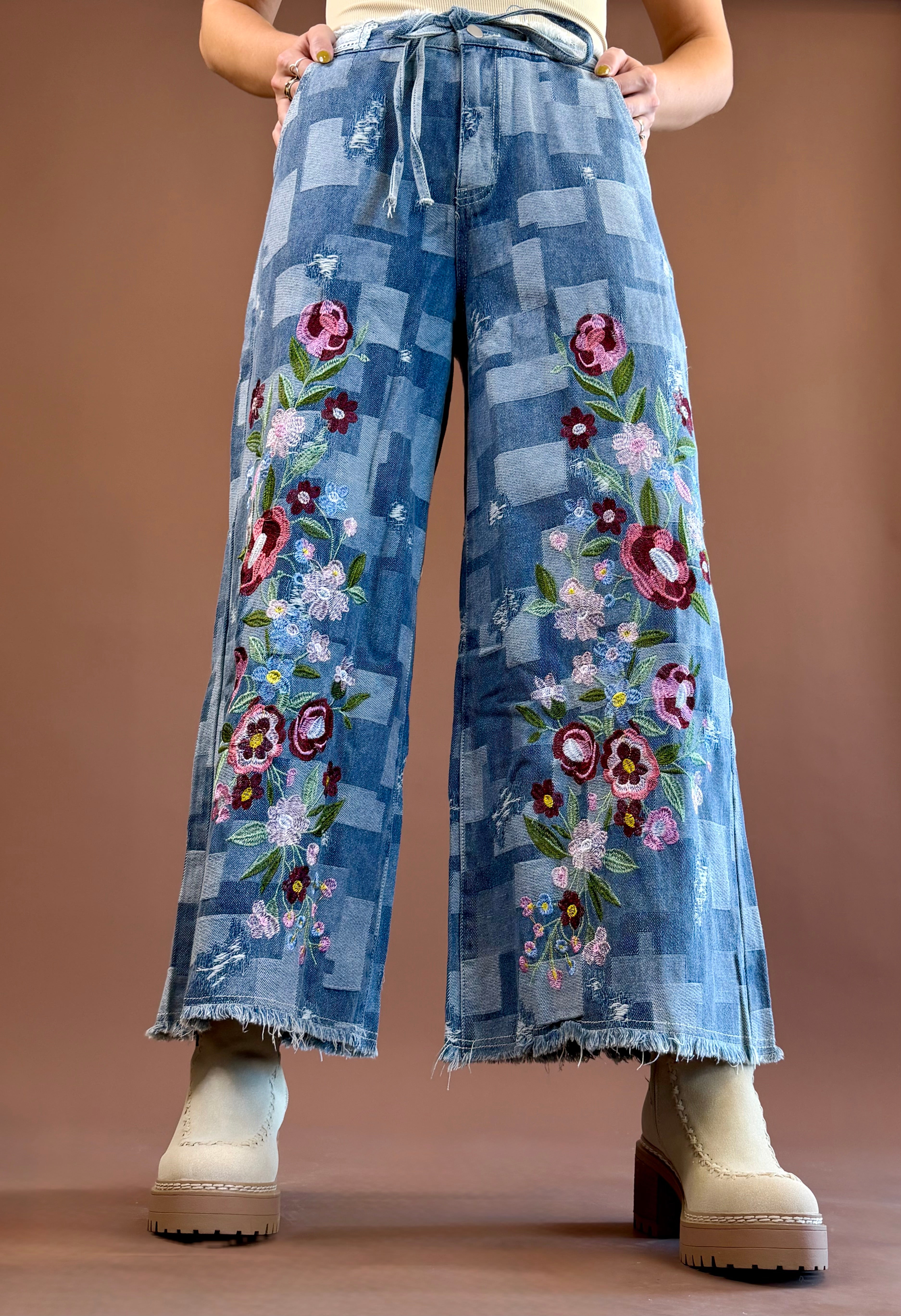 POL Patch Me If You Can women's wide-leg denim pants with a trompe l'oeil patchwork effect, embroidered floral details, and a relaxed silhouette.