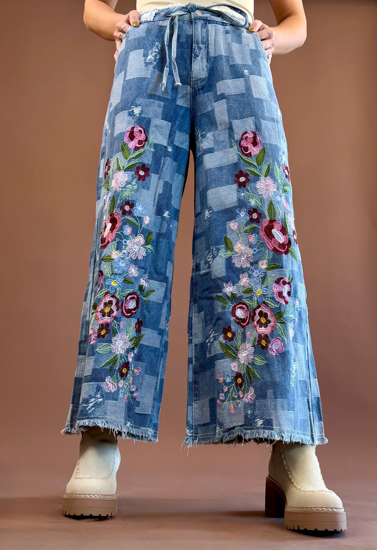 POL Patch Me If You Can women's wide-leg denim pants with a trompe l'oeil patchwork effect, embroidered floral details, and a relaxed silhouette.