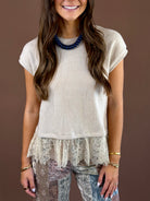 Soft Spoken women’s oatmeal textured knit top with a round neckline, delicate lace-trim detailing, short sleeves, and a relaxed everyday fit