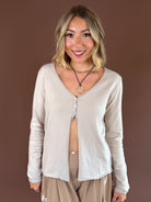 Sweet & Simple women’s long-sleeve knit sweater with a V-neckline, three-button half front, and comfortable layering fit.