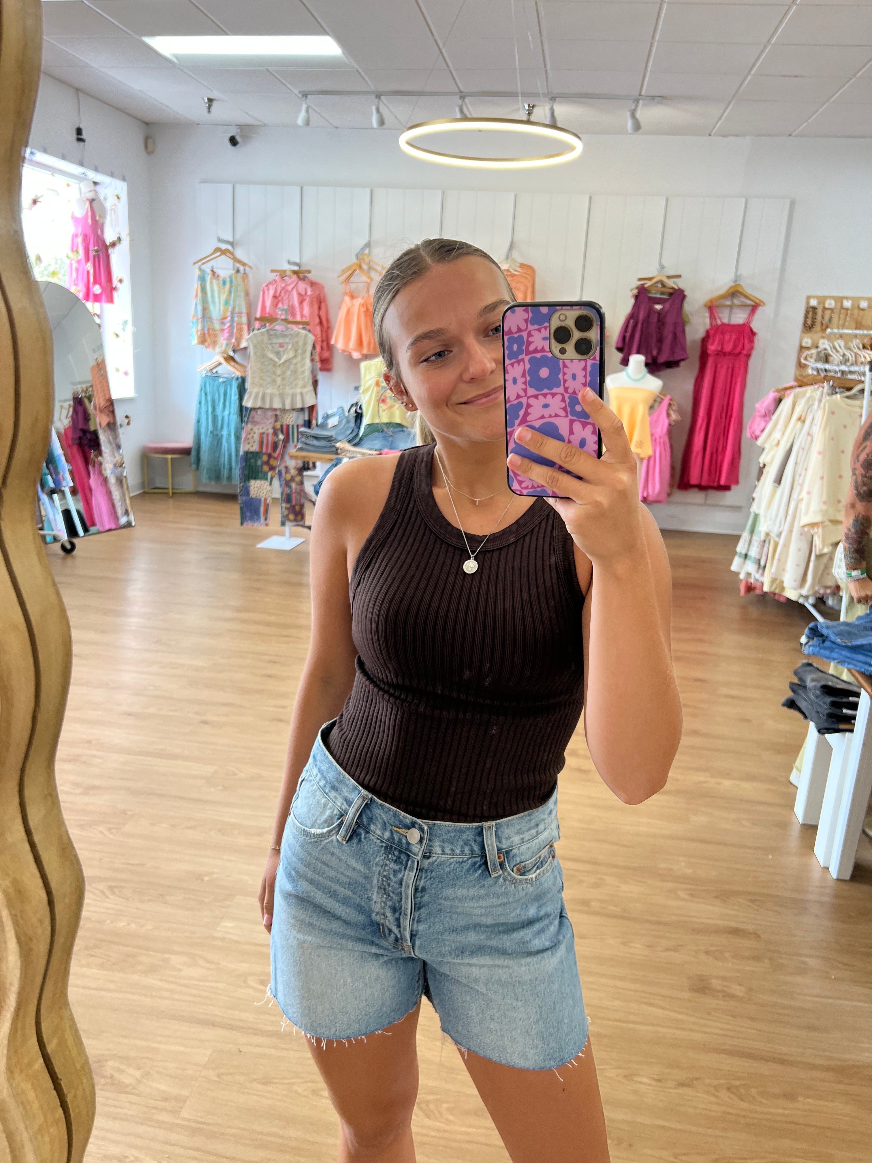 Women’s vintage black seamless cropped tank top with wide ribbed texture, a fitted silhouette, and comfortable stretch.
