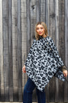 the ally cat walk boutique, theallycatwalk, womens fashion, trendy fashion, trend, 70's style, boho, western, stripes, going out, ootd, bootie season, denim jacket, cheetah print, ootd, tiktok trends, spring style, button scarf, poncho, fall fashion, winter style, winter fashion accessory