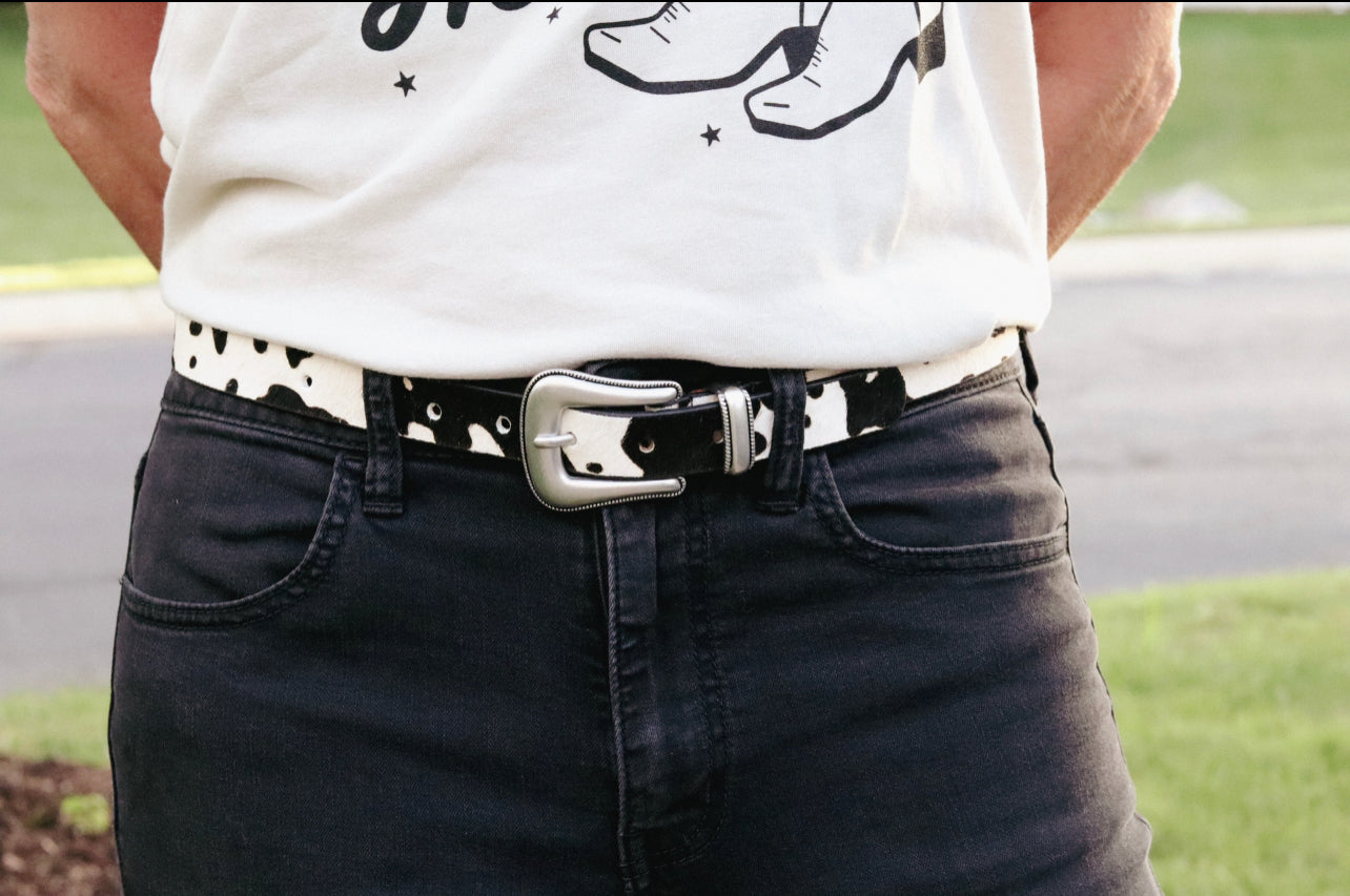 the ally cat walk boutique, theallycatwalk, womens fashion, trendy fashion, trend, 70's style, boho, western, stripes, going out, ootd, bootie season, denim jacket, cheetah print, ootd, tiktok trends, spring style, cow print, belt, leather belt, belt buckle